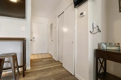 a view of a bathroom from a hallway