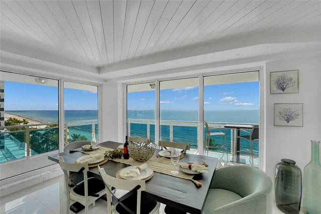 a bedroom with furniture and a flat screen tv