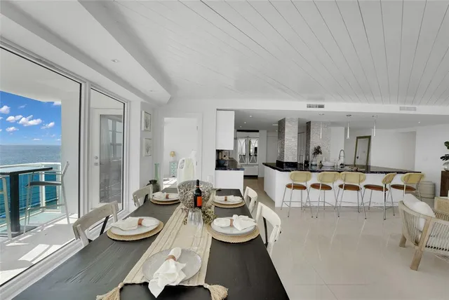 a bedroom with a bed and a night stand