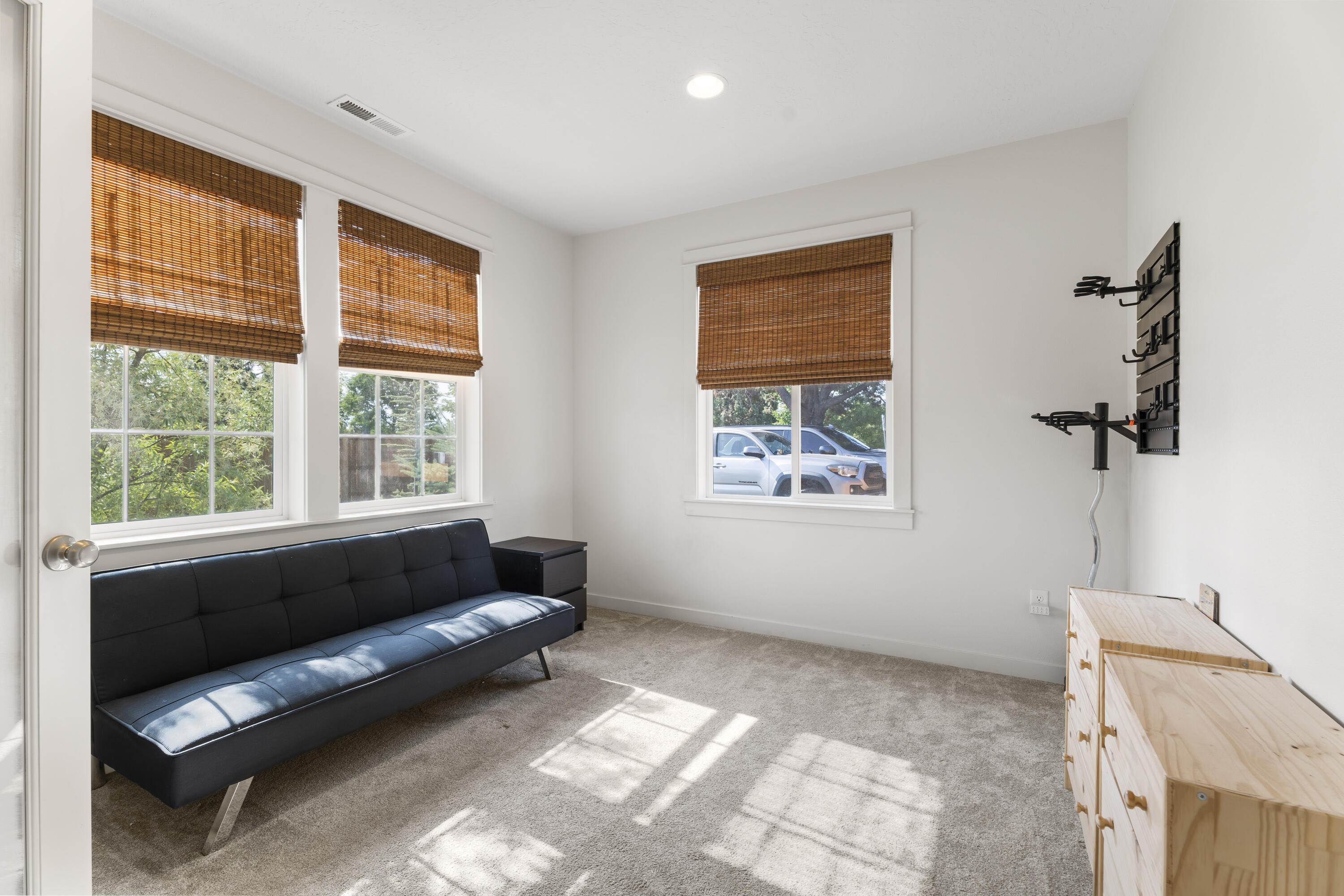 21030 Yeoman Road Bend, OR 97701 - Photo 5 of 66 a living room with furniture and a window