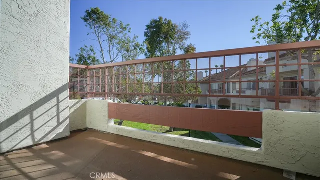 a view of a street from a balcony