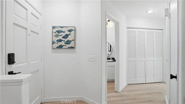 a bathroom with a shower and a sink