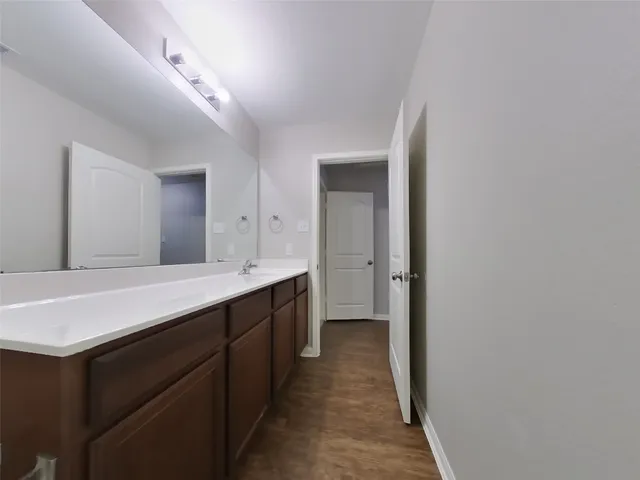 a bathroom with a sink a toilet and a bathtub