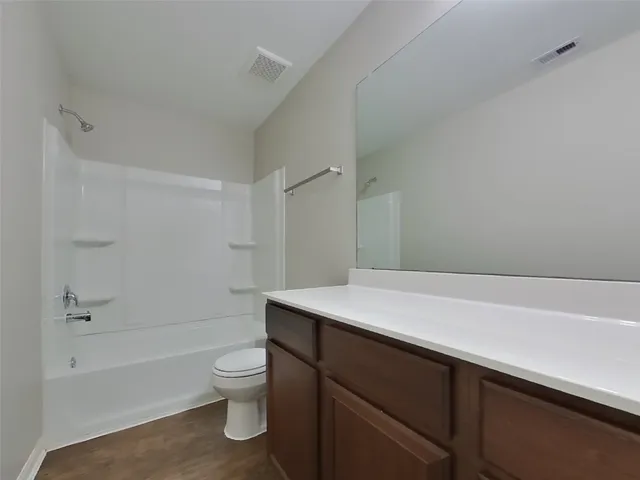 a view of a backyard with plants