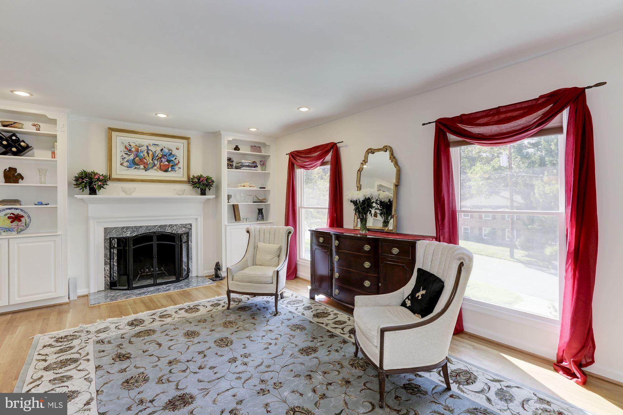7609 Sebago Road Bethesda, MD 20817 - Photo 17 of 46 Living Room with wood-burning Fireplace