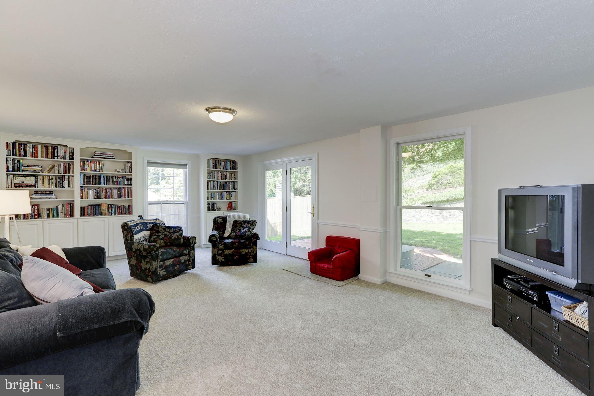 7609 Sebago Road Bethesda, MD 20817 - Photo 31 of 46 Family Room in lower level (carpet 2019)