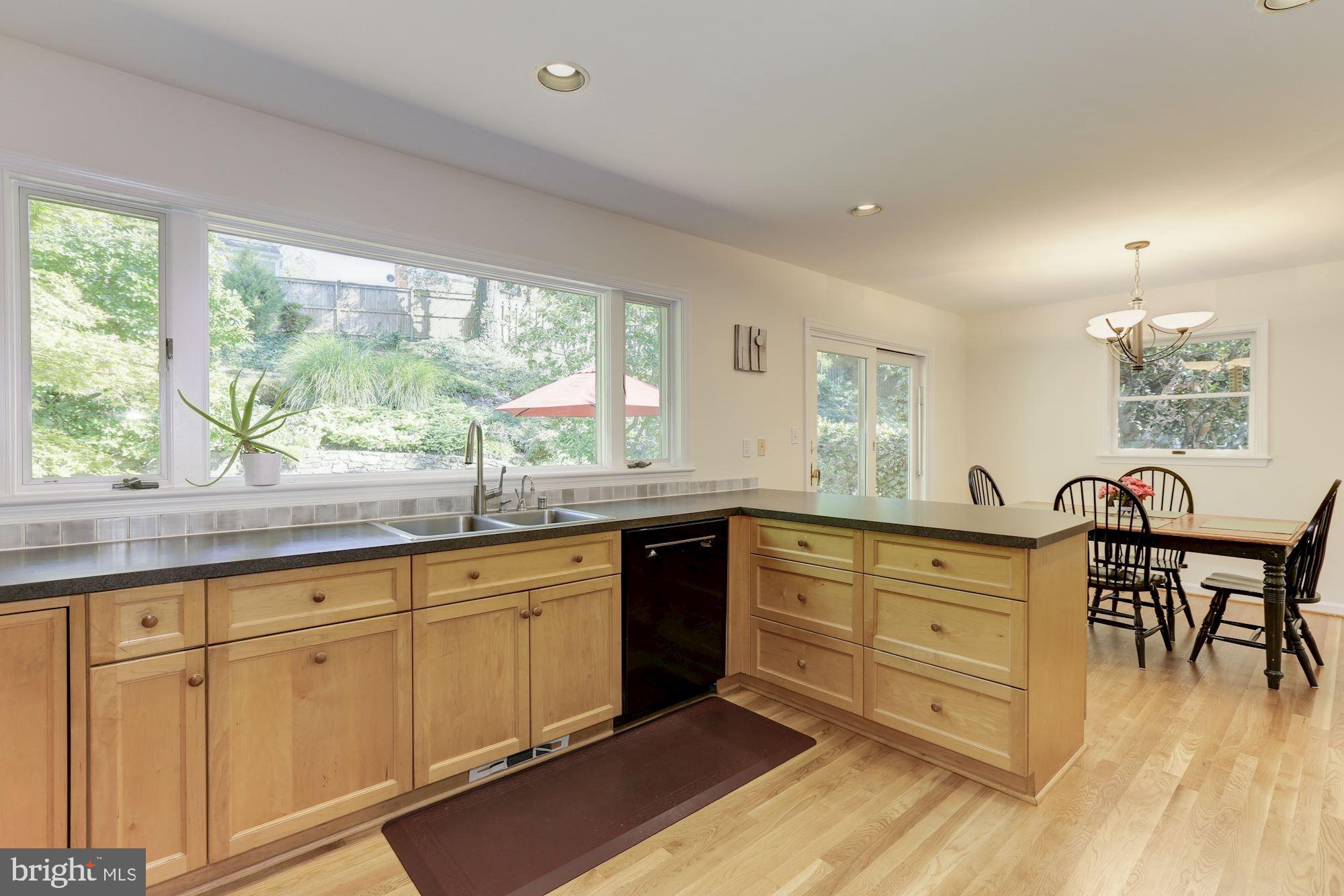 7609 Sebago Road Bethesda, MD 20817 - Photo 7 of 46 Wall of windows open to rear yard