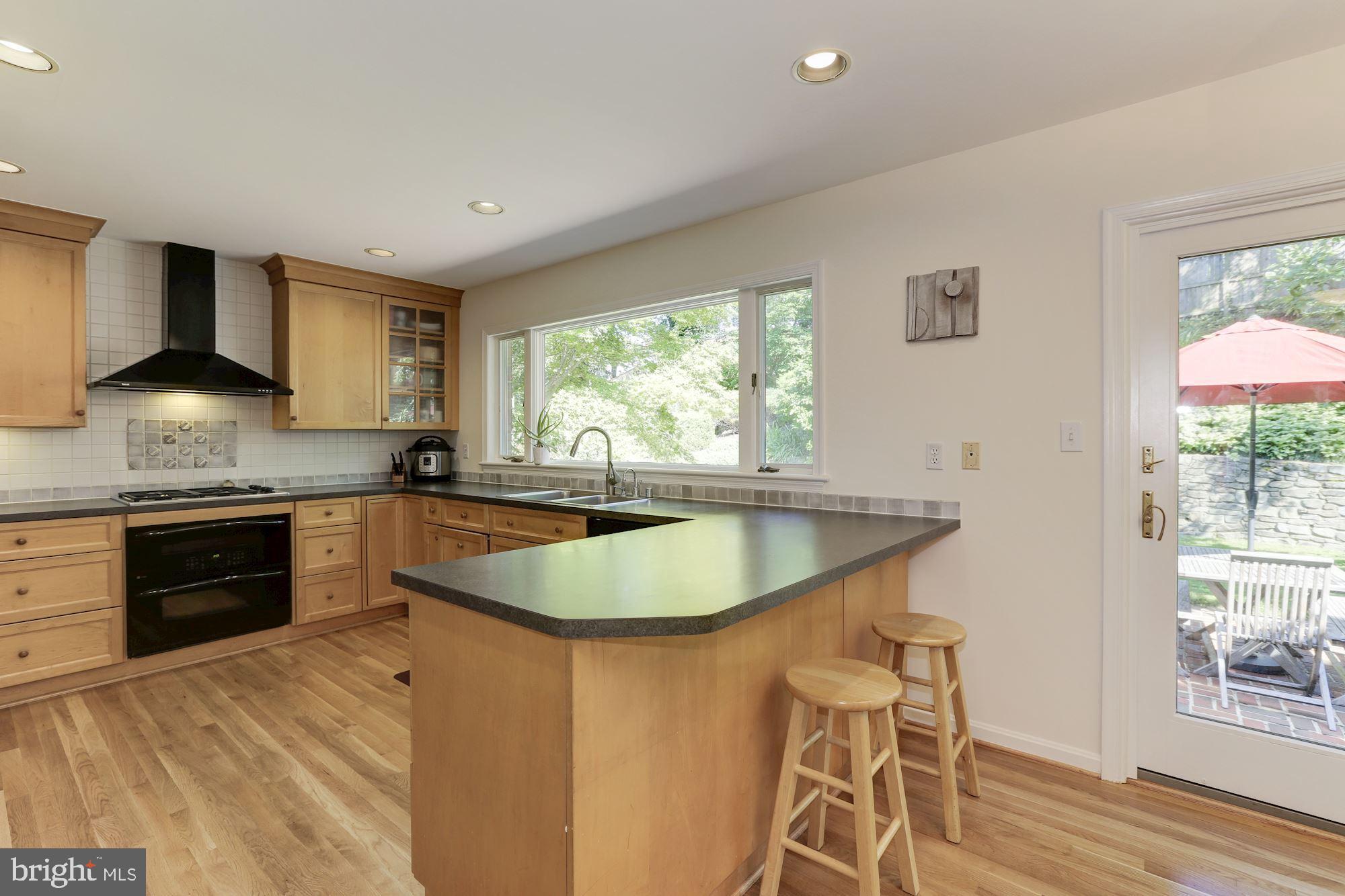 7609 Sebago Road Bethesda, MD 20817 - Photo 10 of 46 Kitchen with breakfast bar
