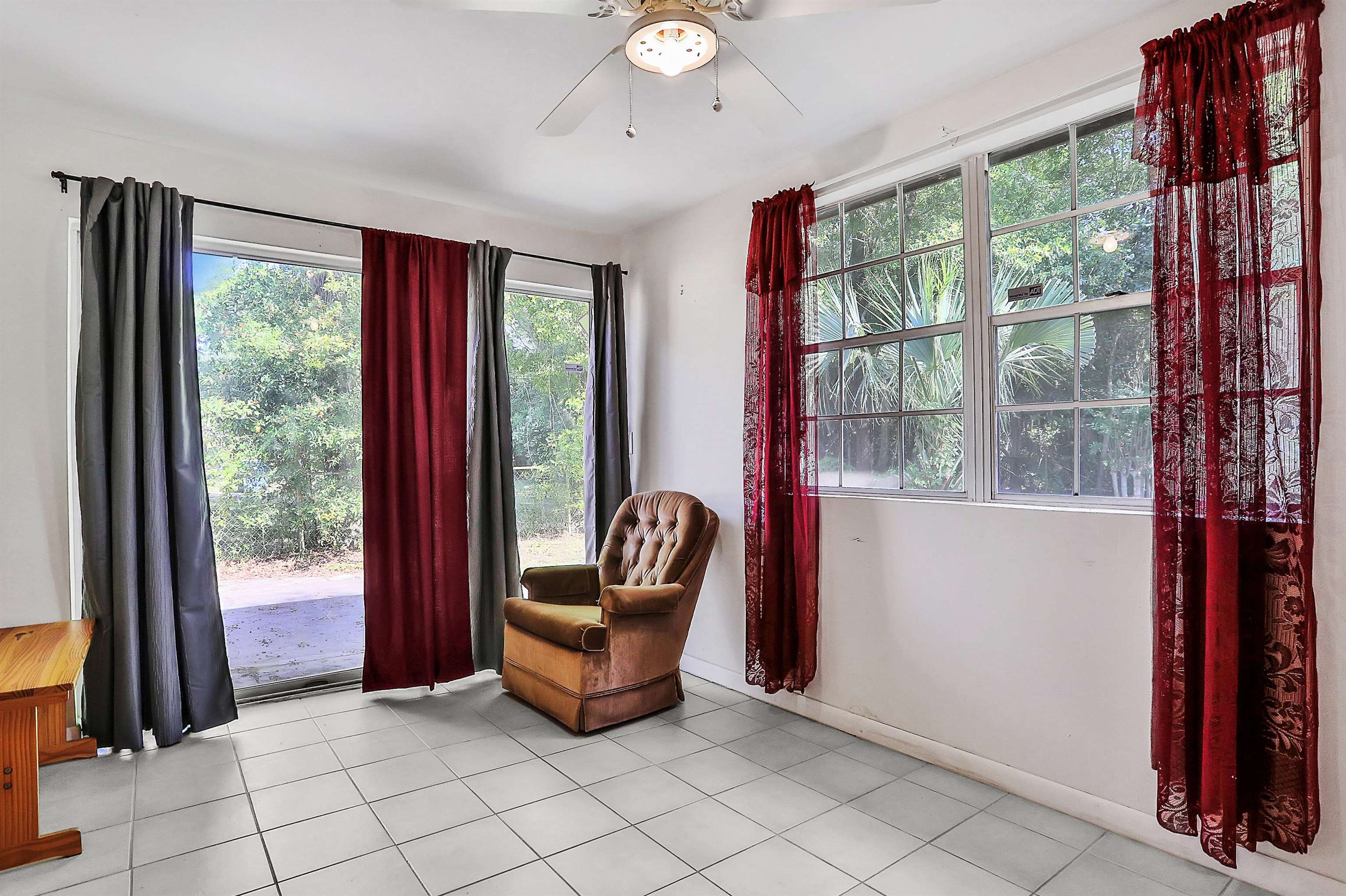 6710 Heidi Road Jacksonville, FL 32277 - Photo 7 of 23 a view of room with window and furniture
