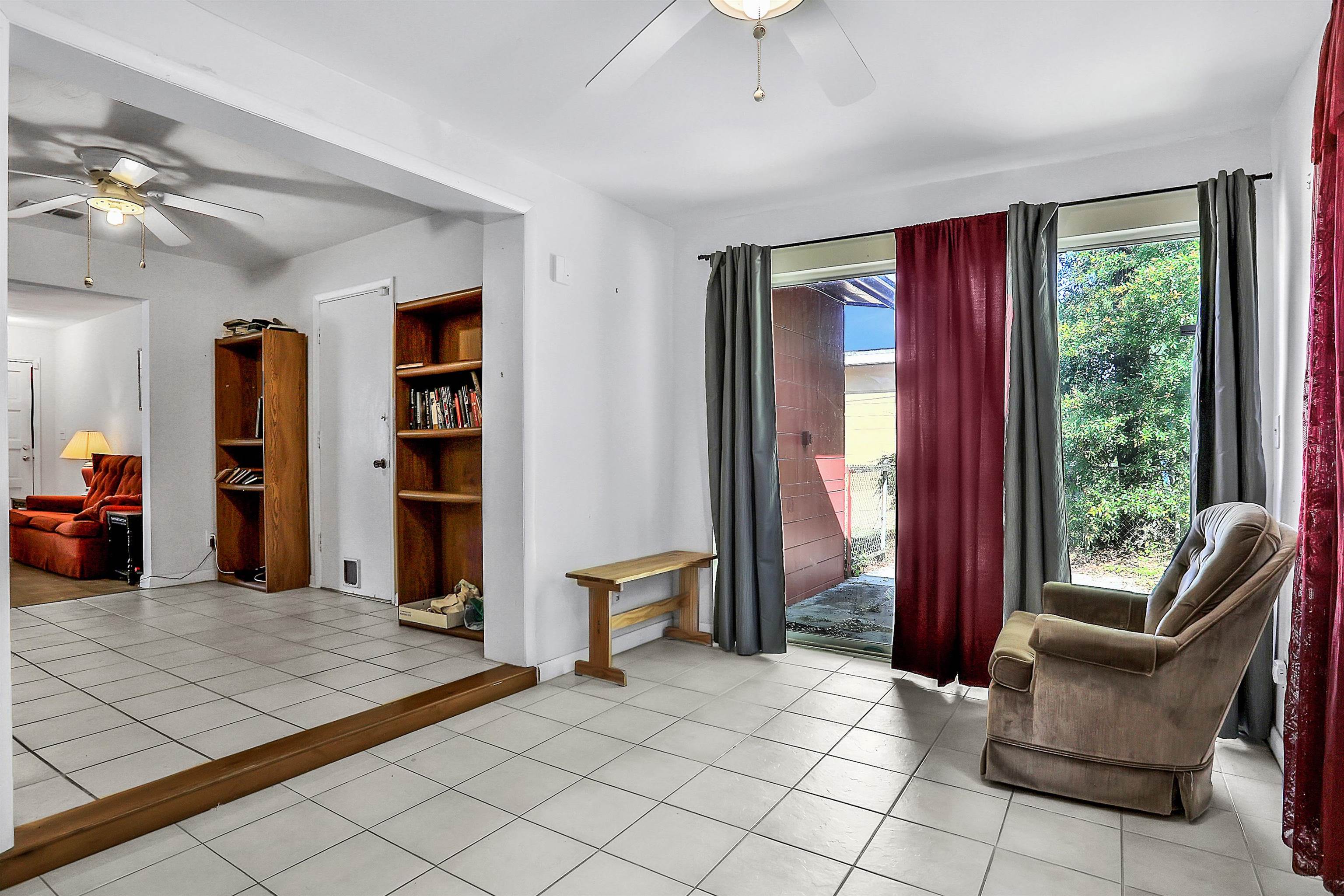 6710 Heidi Road Jacksonville, FL 32277 - Photo 8 of 23 a view of a livingroom with furniture and window