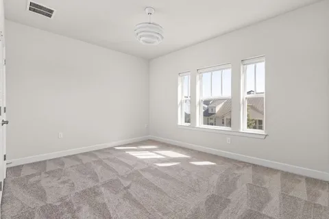 a bathroom with 2 sink and a mirror