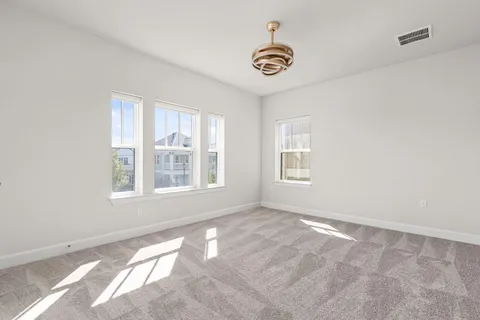 a view of a patio with couches chairs and a yard