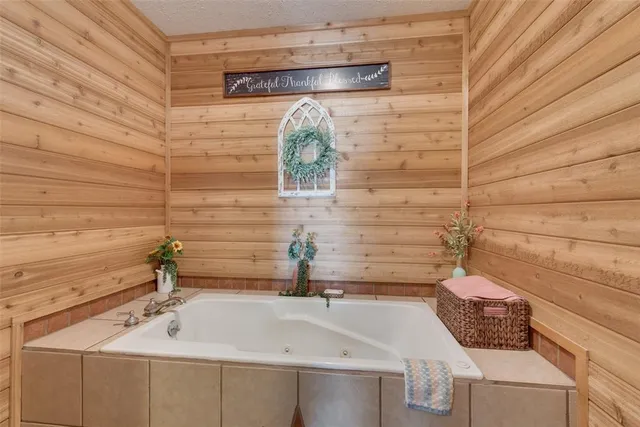 a bathroom with a sink and a bathtub