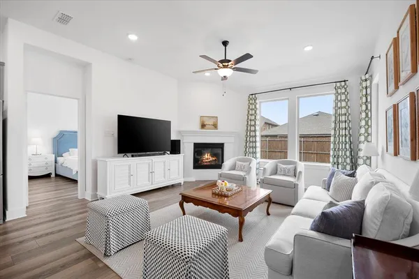 a kitchen with a sink a counter top space and stainless steel appliances