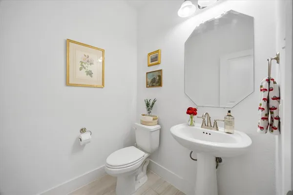 a view of walk in closet with clothes