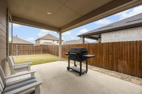 a bathroom with a double vanity sink mirror and toilet