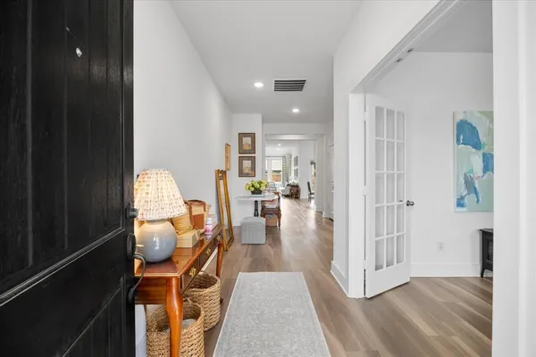 a view of a living room and dining room