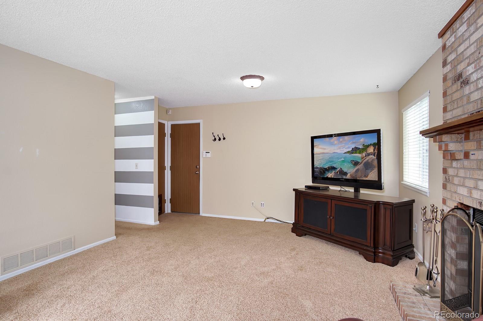 417 Ridgeglen Way Highlands Ranch, CO 80126 - Photo 13 of 33 a view of workspace with flat screen tv