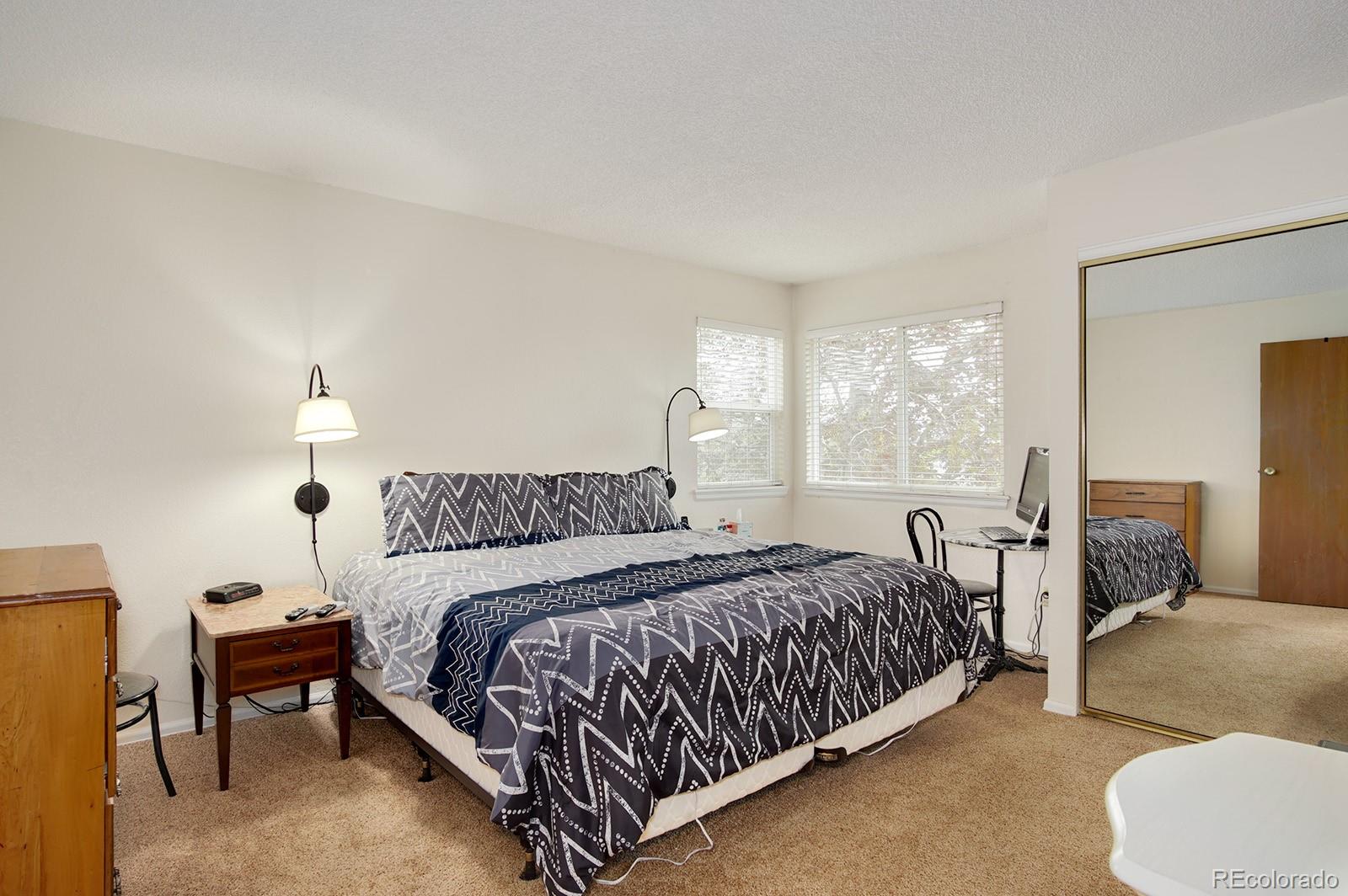 417 Ridgeglen Way Highlands Ranch, CO 80126 - Photo 15 of 33 a bedroom with a bed and a window