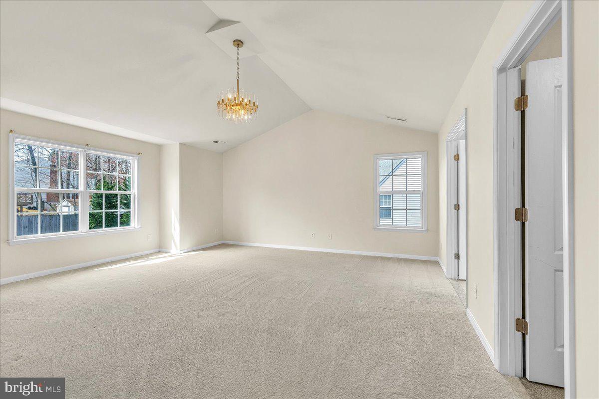 9588 Clover Hill Road Manassas, VA 20110 - Photo 17 of 32 a view of an empty room with a window