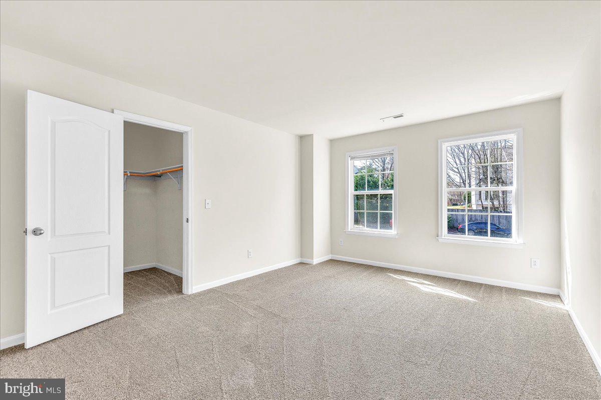 9588 Clover Hill Road Manassas, VA 20110 - Photo 25 of 32 an empty room with windows