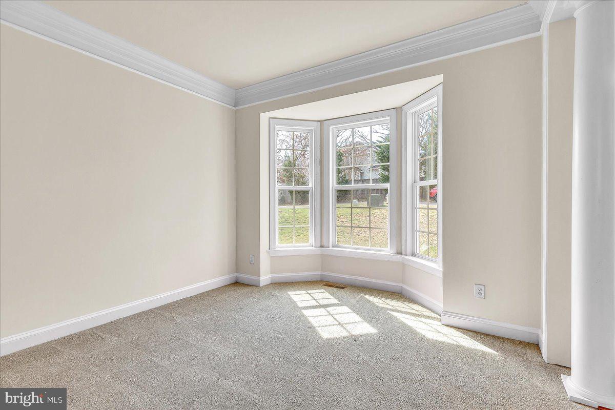 9588 Clover Hill Road Manassas, VA 20110 - Photo 5 of 32 a view of empty room with a window