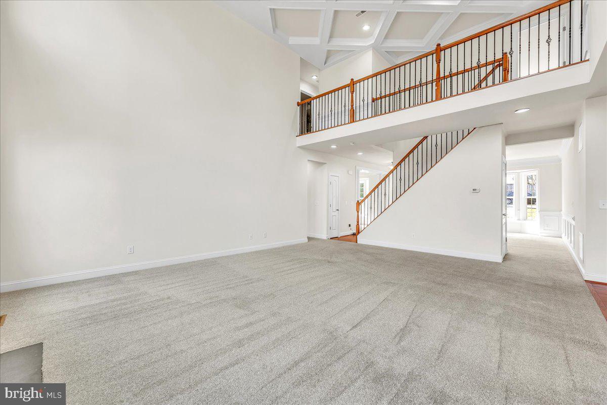 9588 Clover Hill Road Manassas, VA 20110 - Photo 7 of 32 a view of an entryway with staircase