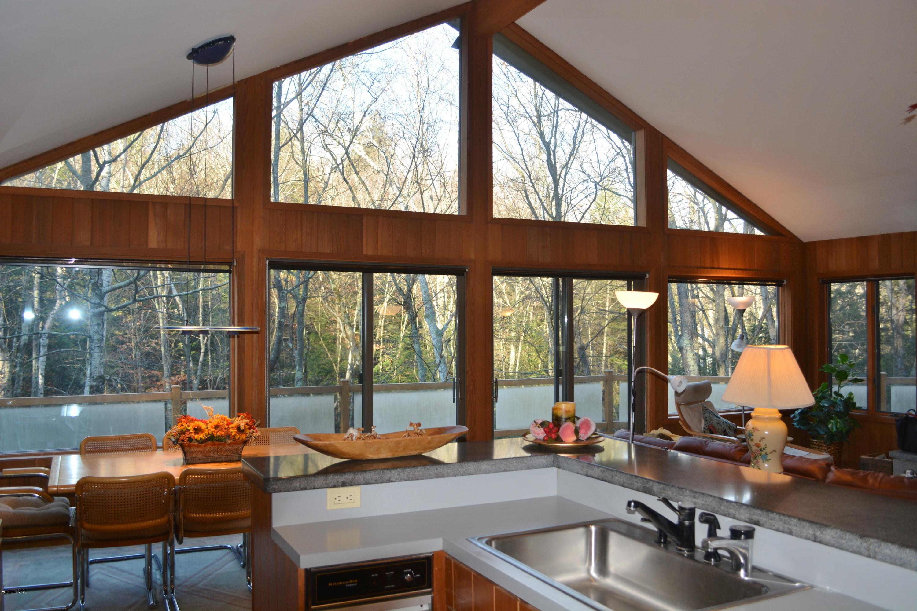 138 Bonny Rigg Hill Road Becket, MA 01223 - Photo 13 of 39 a room with furniture and a large window