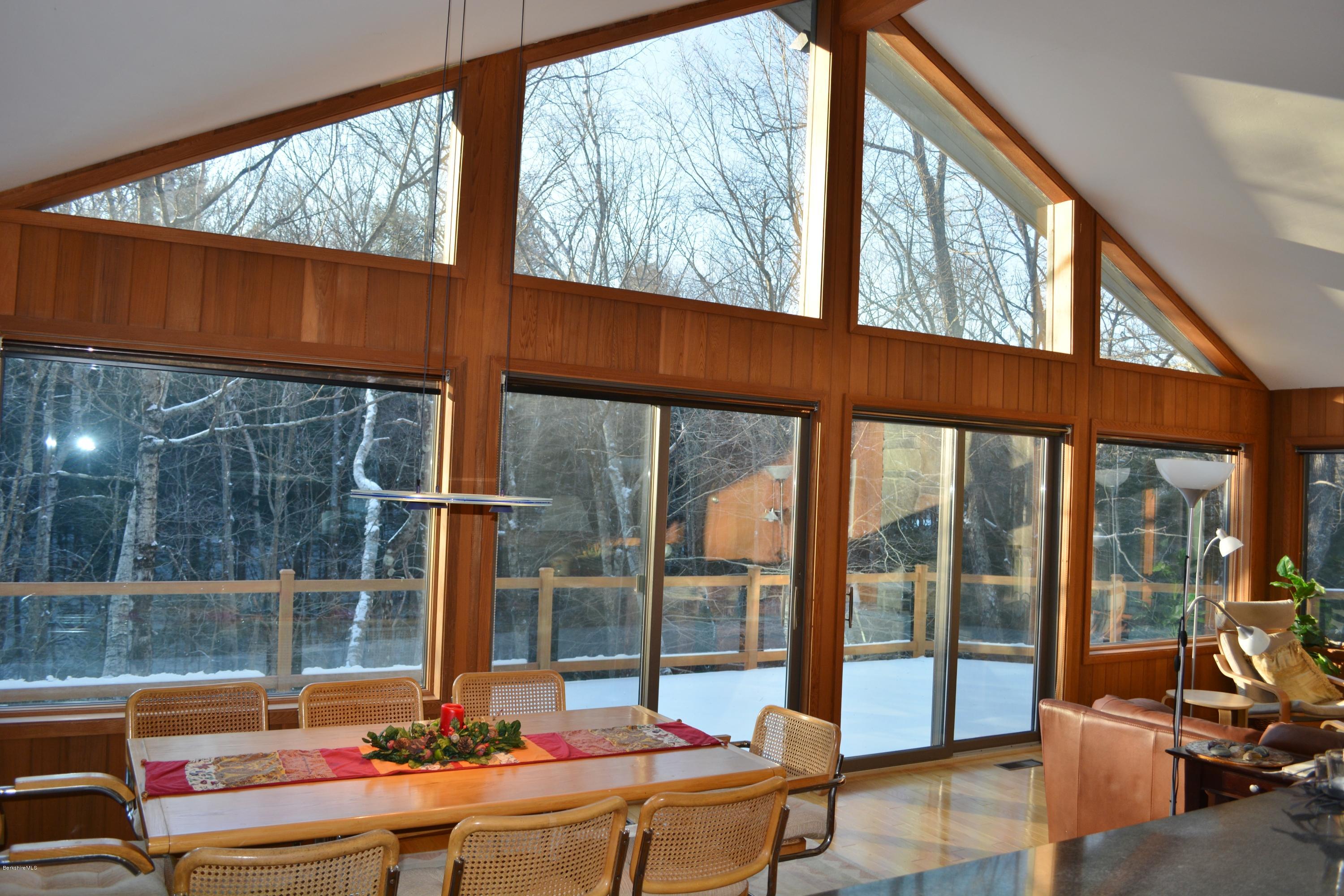 138 Bonny Rigg Hill Road Becket, MA 01223 - Photo 14 of 39 a room with musical instrument and windows