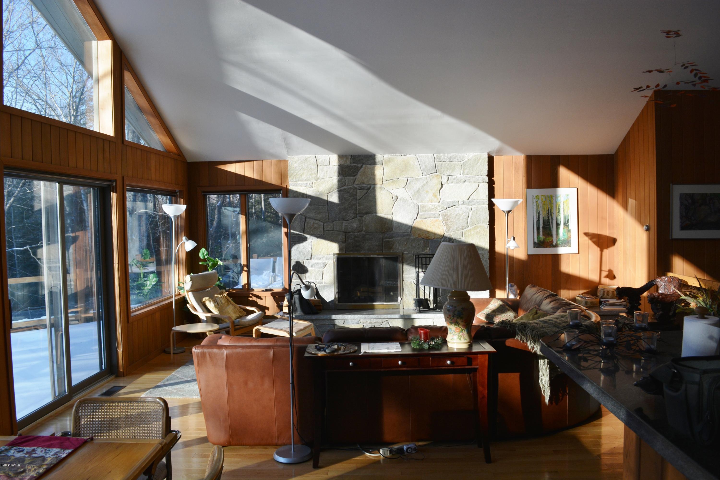 138 Bonny Rigg Hill Road Becket, MA 01223 - Photo 17 of 39 a room with lots of wooden furniture