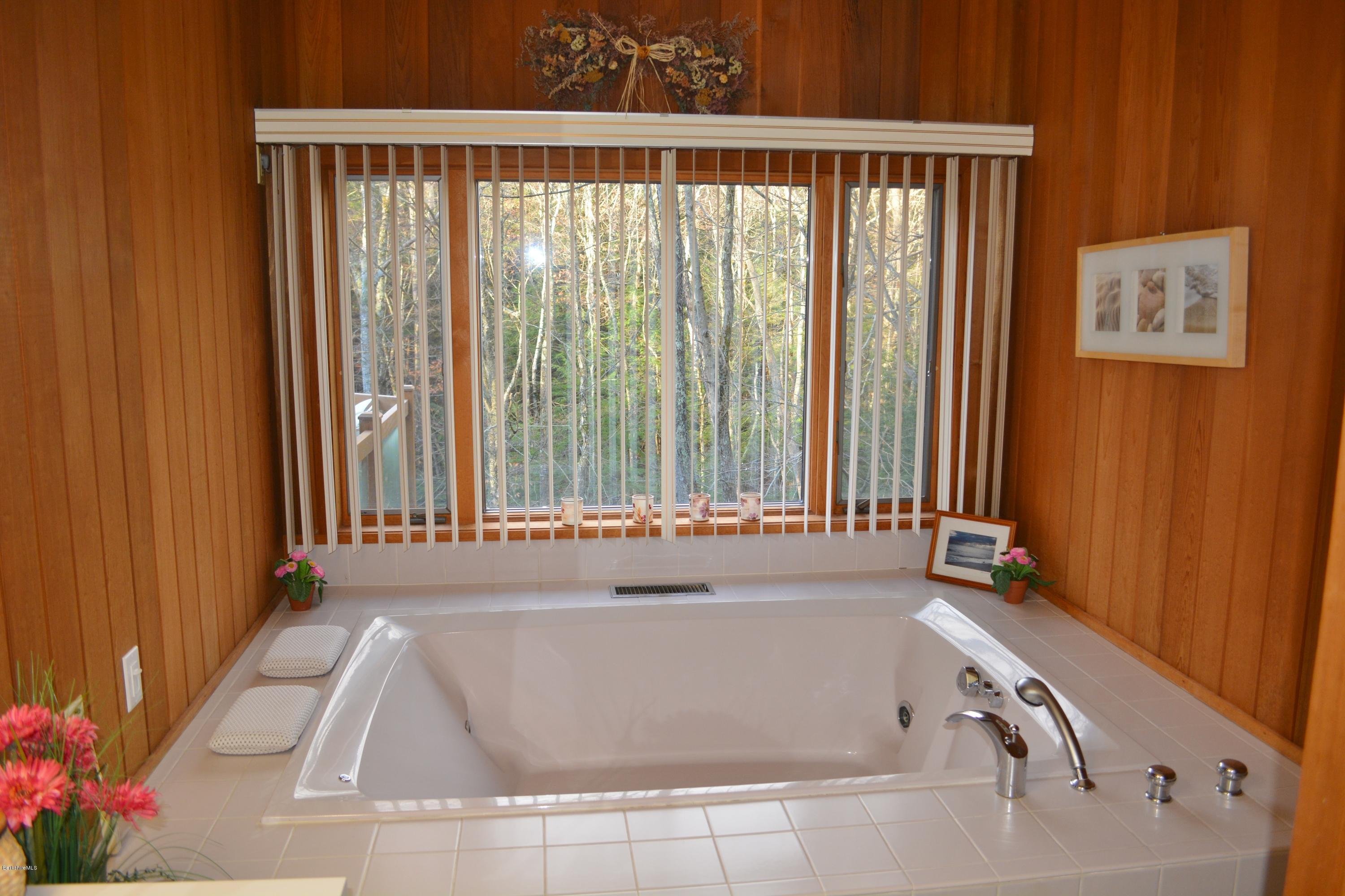 138 Bonny Rigg Hill Road Becket, MA 01223 - Photo 21 of 39 a bath tub sitting in a bathroom next to a window
