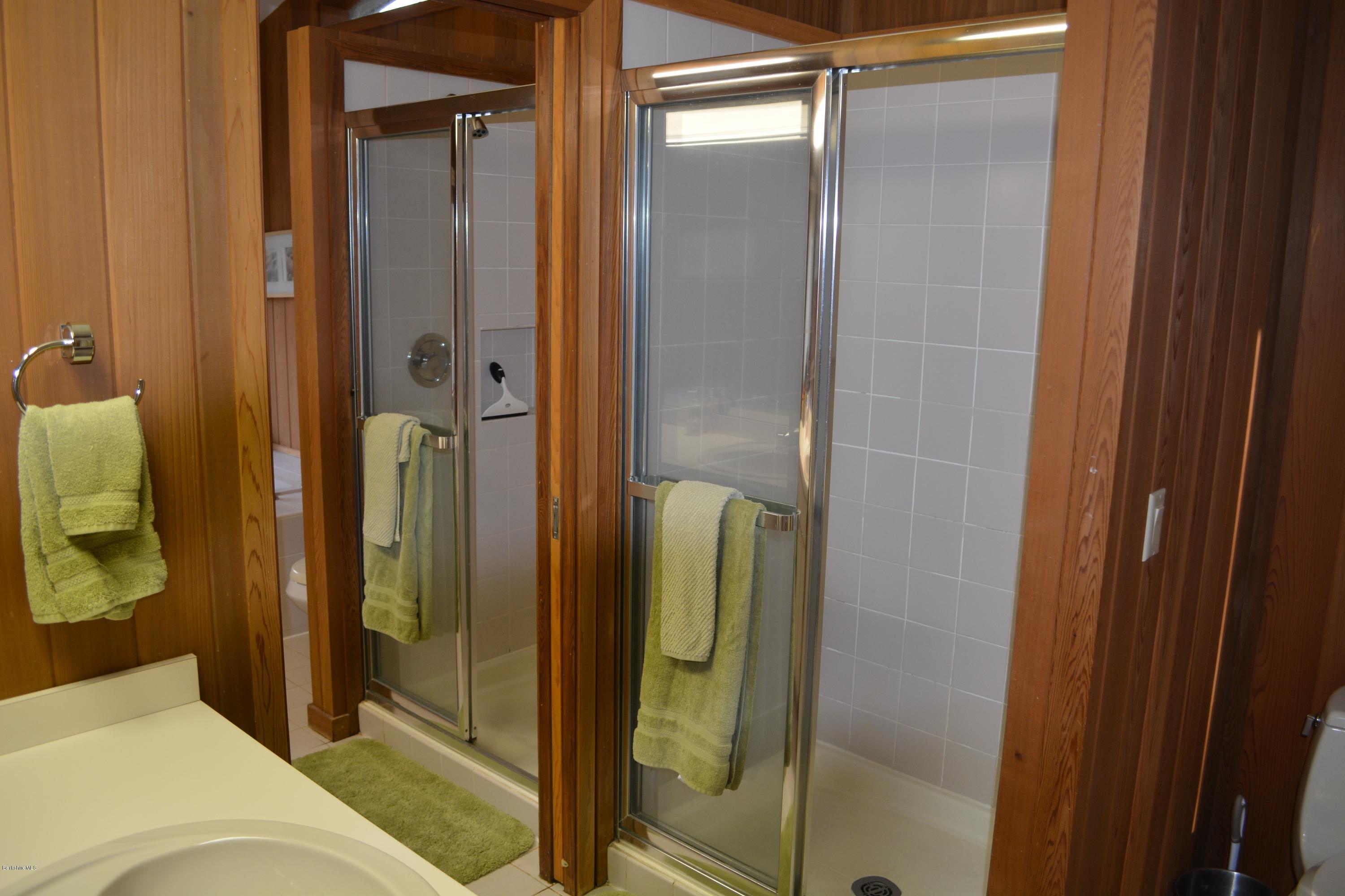 138 Bonny Rigg Hill Road Becket, MA 01223 - Photo 22 of 39 a bathroom with a shower and a sink