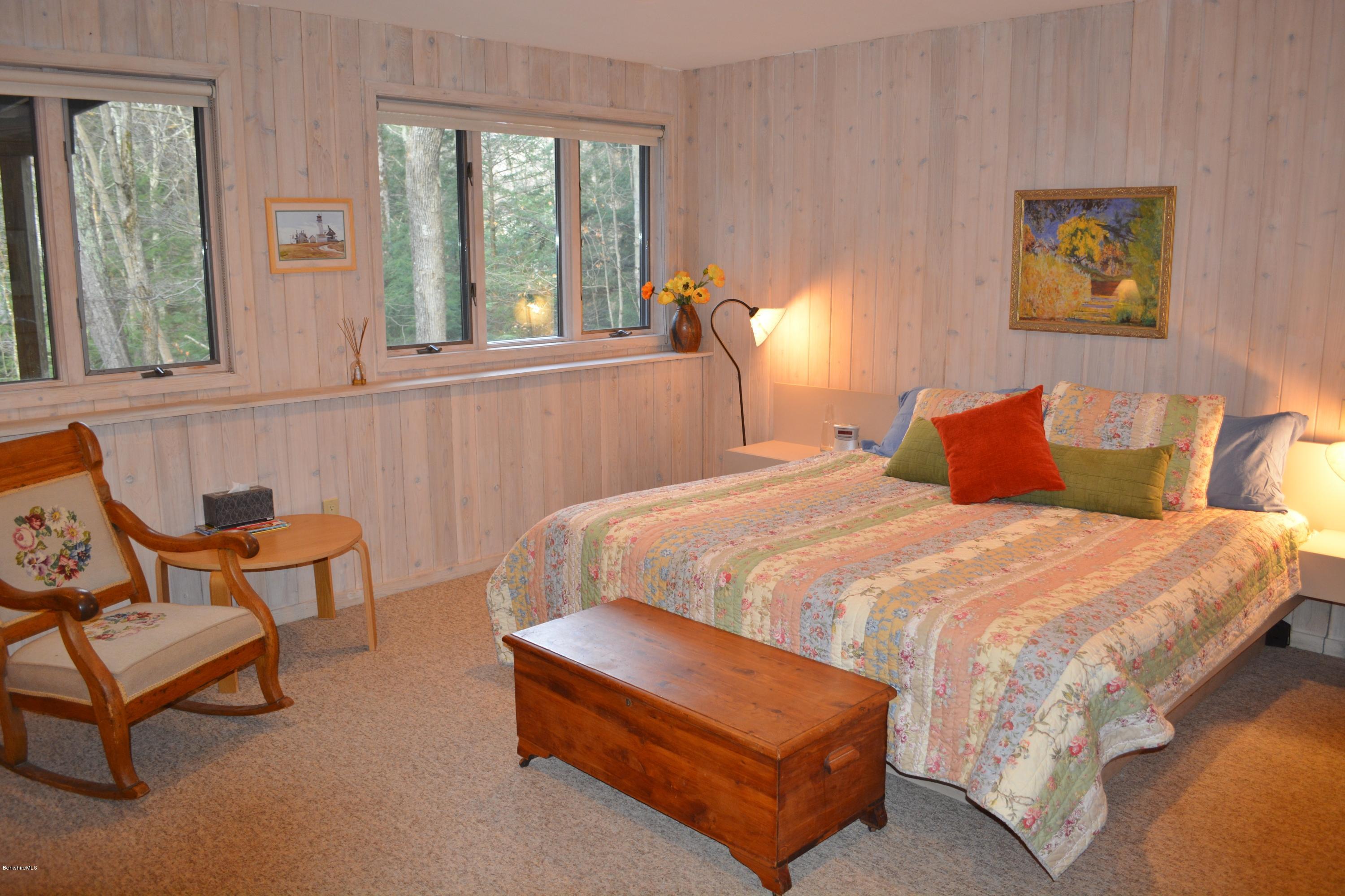 138 Bonny Rigg Hill Road Becket, MA 01223 - Photo 27 of 39 a bedroom with a bed chair and window