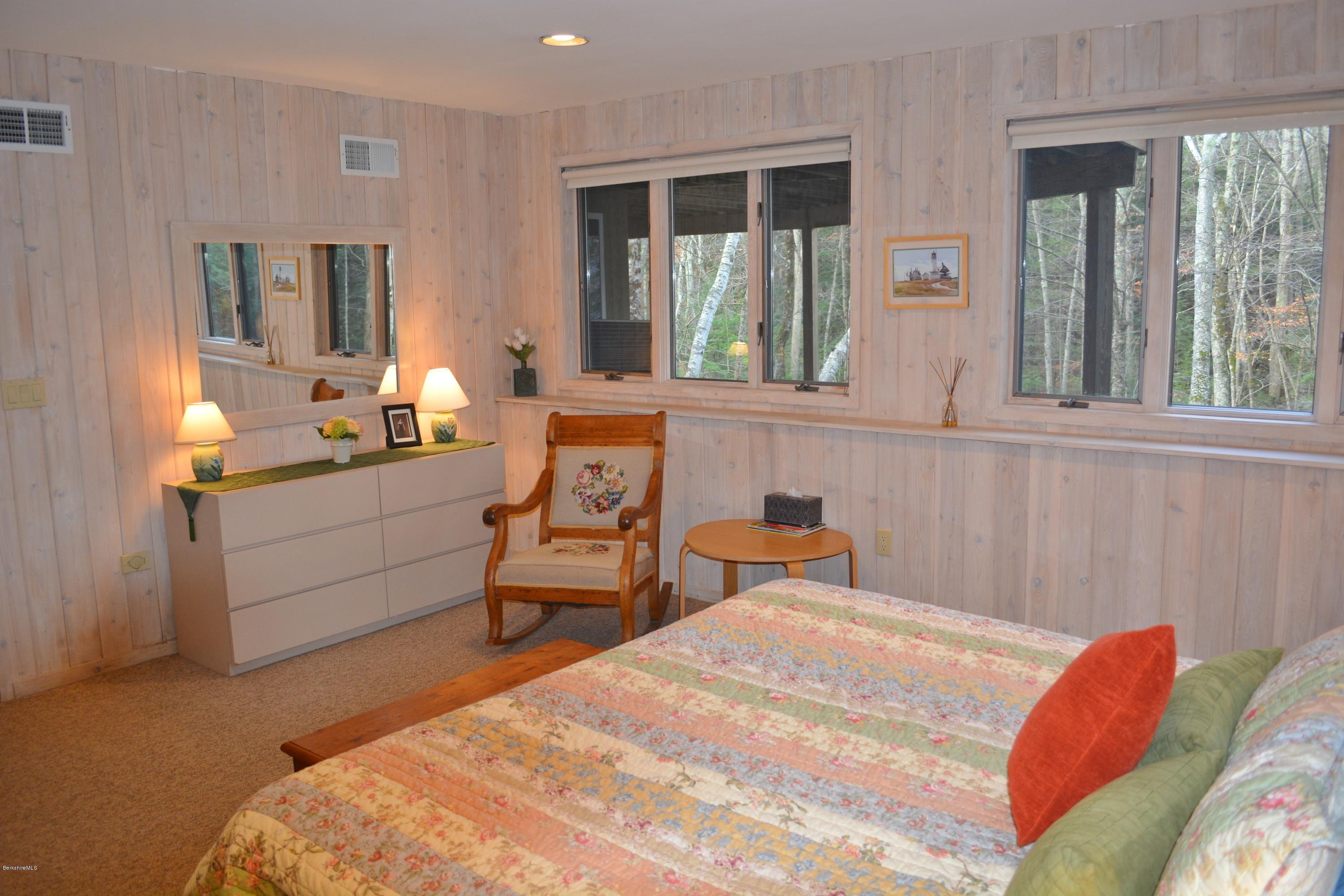 138 Bonny Rigg Hill Road Becket, MA 01223 - Photo 28 of 39 a bedroom with a bed and a window