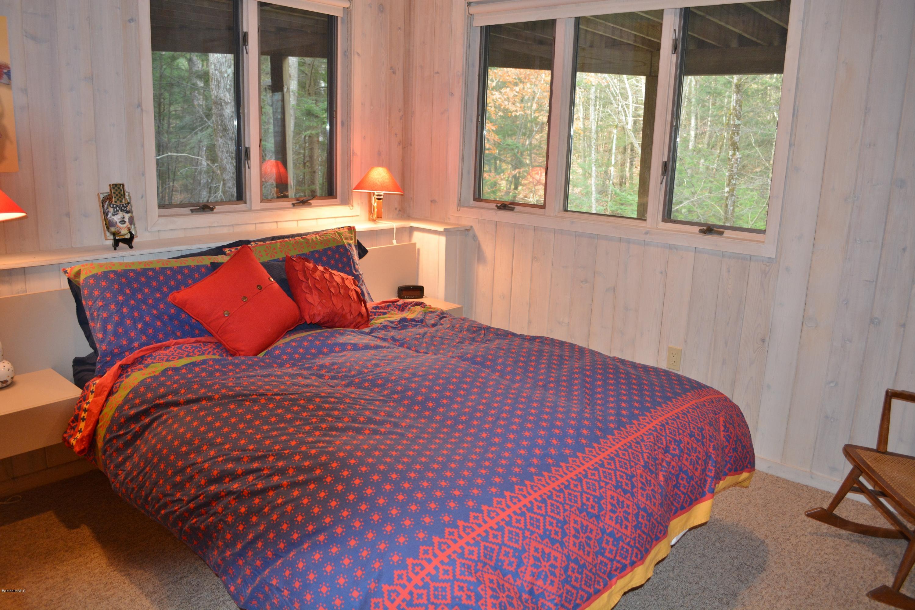 138 Bonny Rigg Hill Road Becket, MA 01223 - Photo 29 of 39 a bedroom with bed and windows