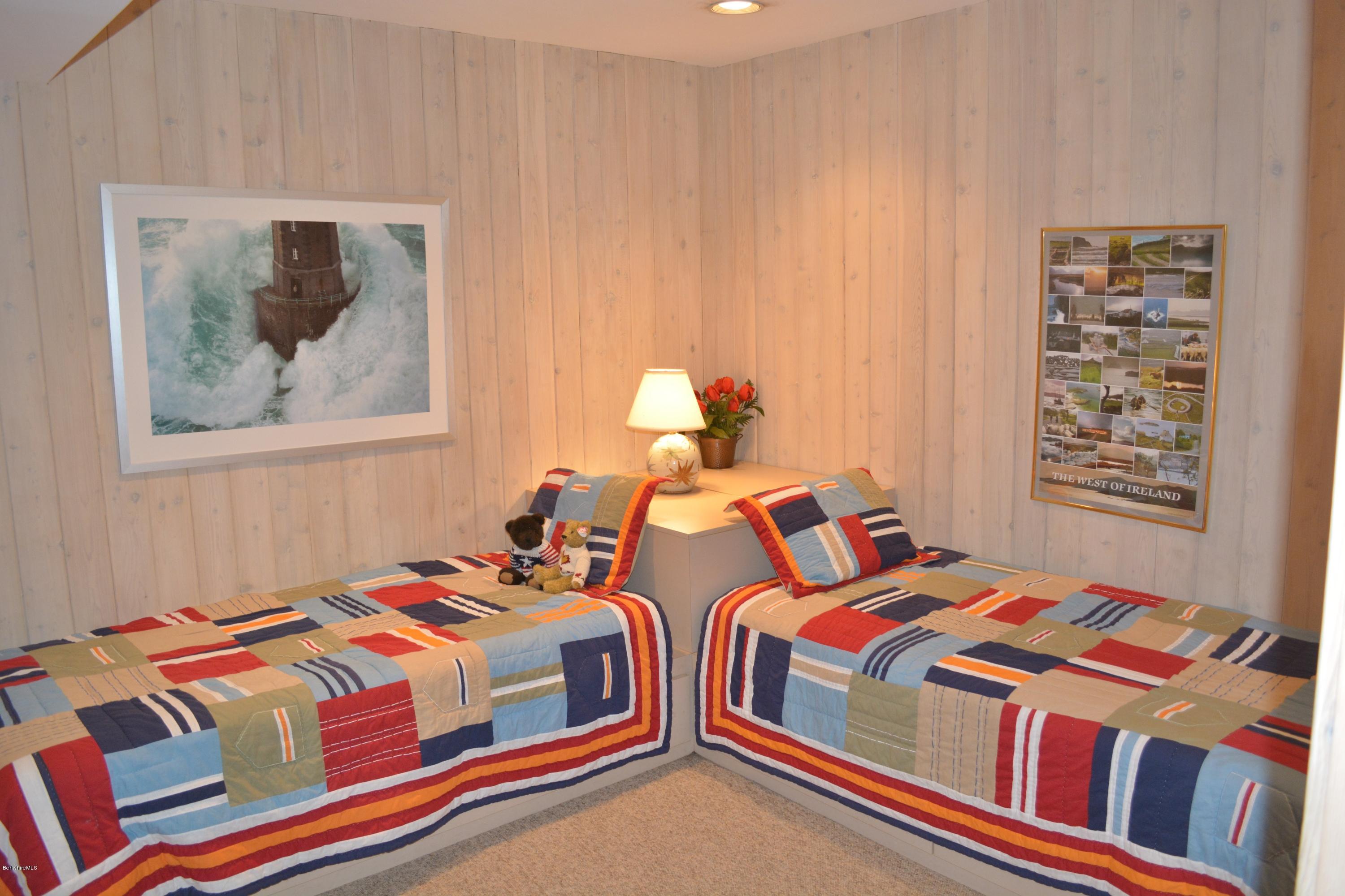 138 Bonny Rigg Hill Road Becket, MA 01223 - Photo 30 of 39 a bedroom with two beds and a painting on the wall