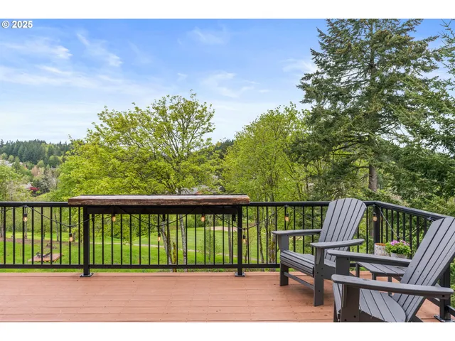 a view of a wooden deck with a bench