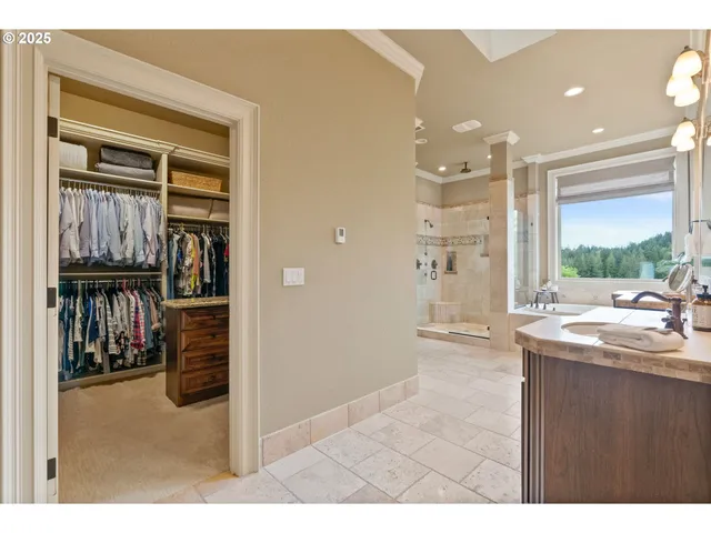 a open kitchen with kitchen island a sink stainless steel appliances and cabinets
