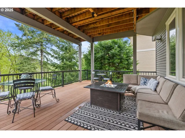 a view of a chair and tables the patio