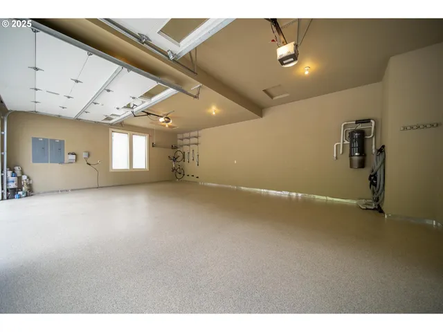 a view of a livingroom with furniture and a flat screen tv