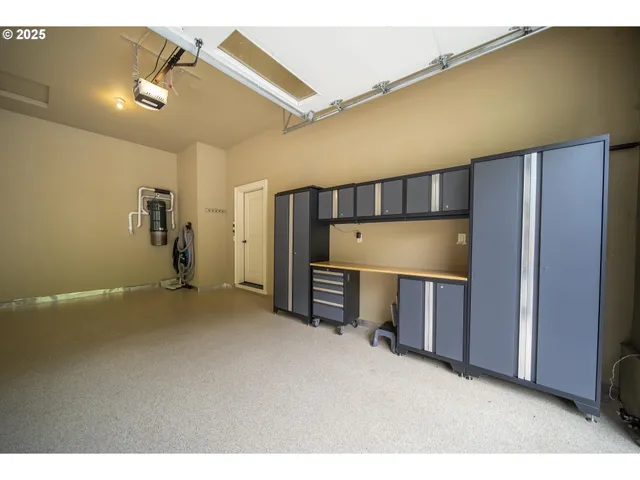 a aerial view of a house with a yard