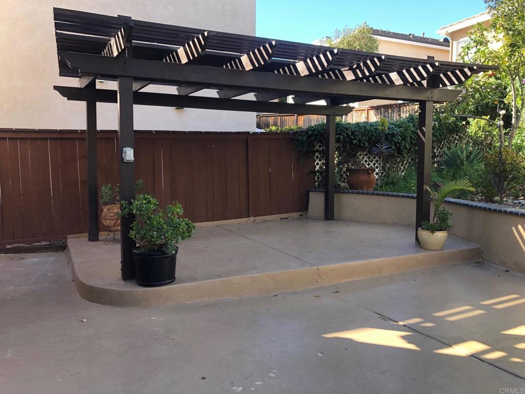130 Venetia Way Oceanside, CA 92057 - Photo 13 of 19 a view of a street with potted plants