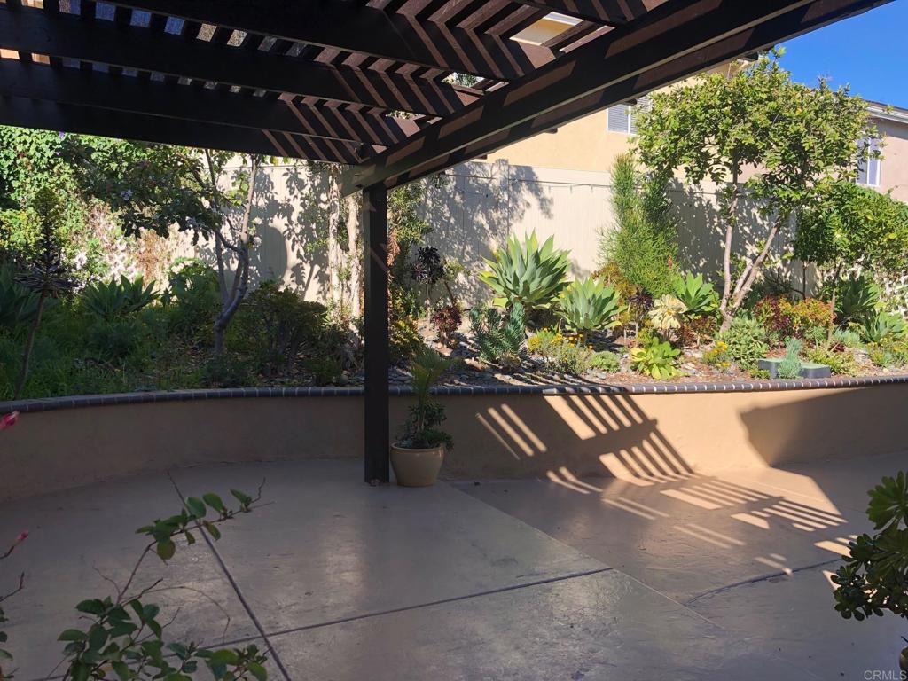 130 Venetia Way Oceanside, CA 92057 - Photo 14 of 19 a view of outdoor space with a garden