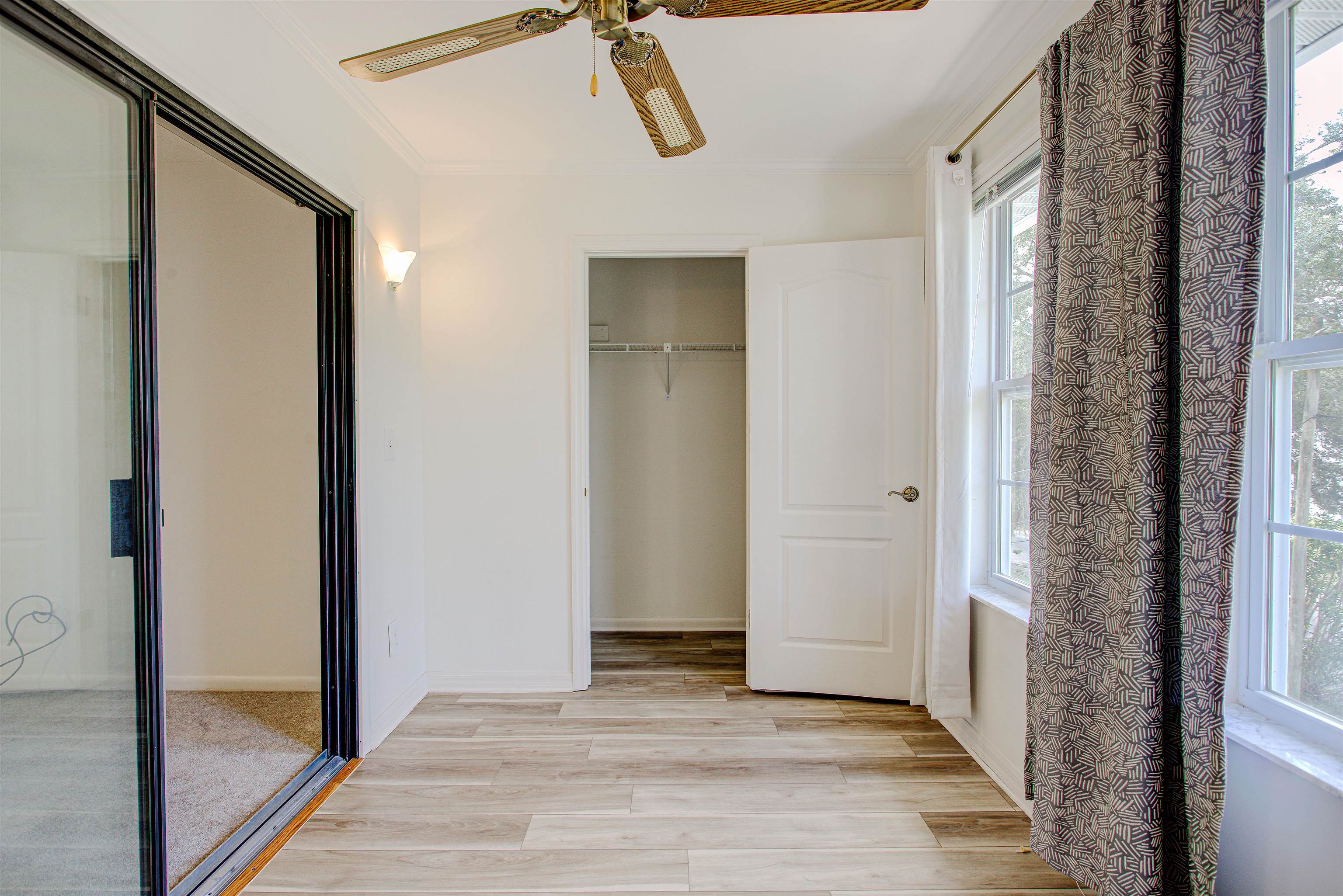 21 Atlantic Oaks Circle St. Augustine, FL 32080 - Photo 11 of 21 a view of a hallway with wooden floor and cabinet