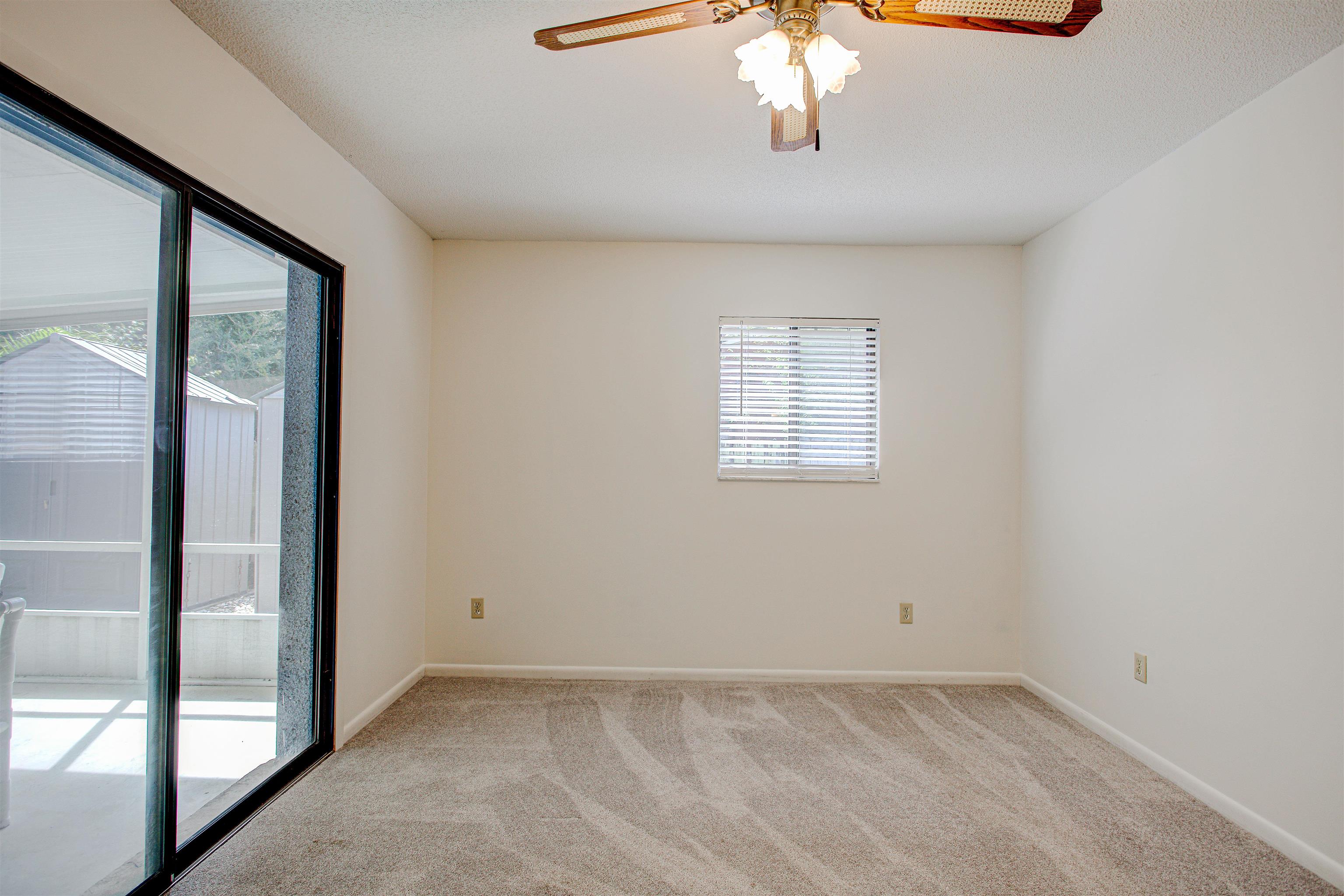 21 Atlantic Oaks Circle St. Augustine, FL 32080 - Photo 17 of 21 an empty room with chandelier fan