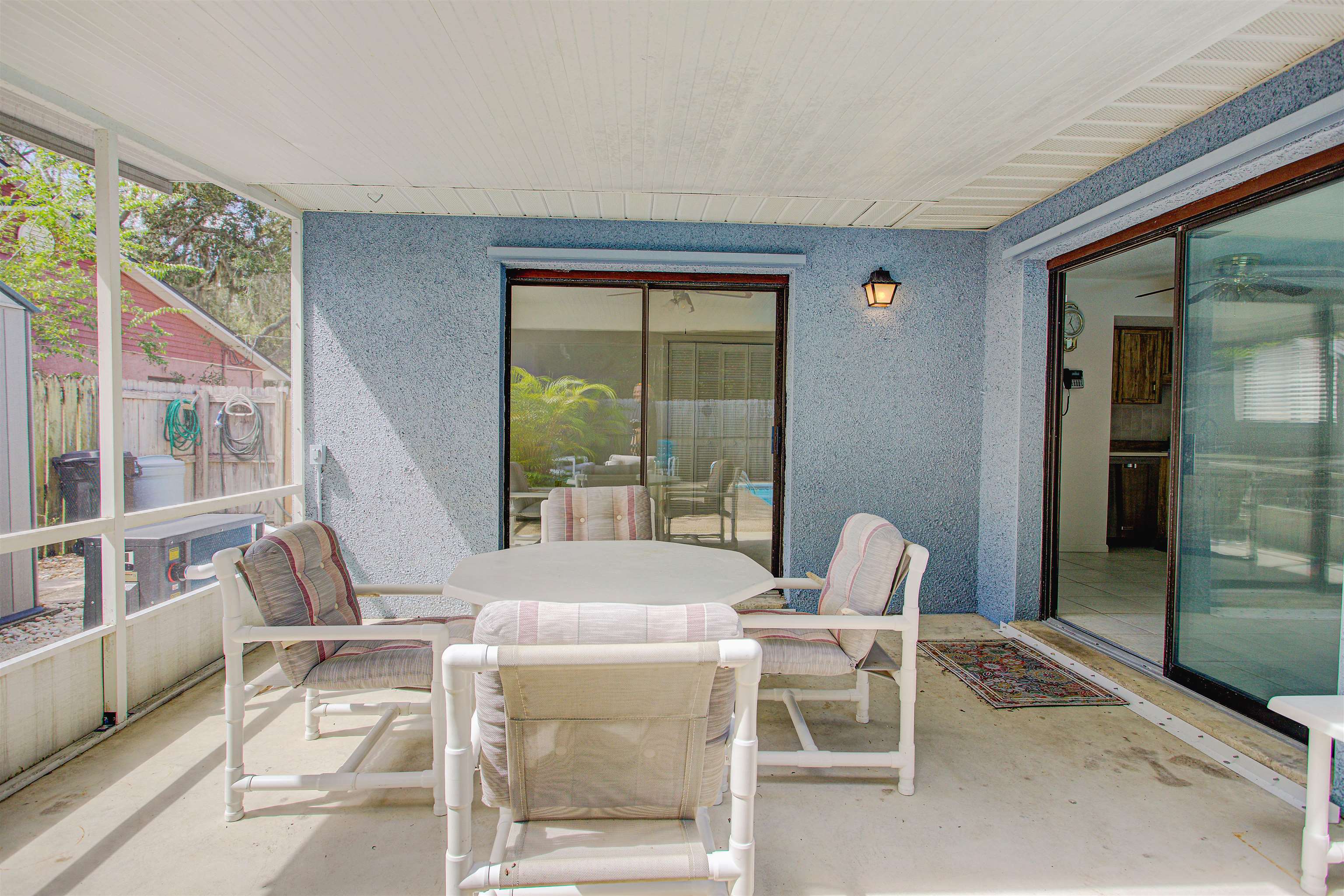 21 Atlantic Oaks Circle St. Augustine, FL 32080 - Photo 5 of 21 a dining room with furniture and large windows