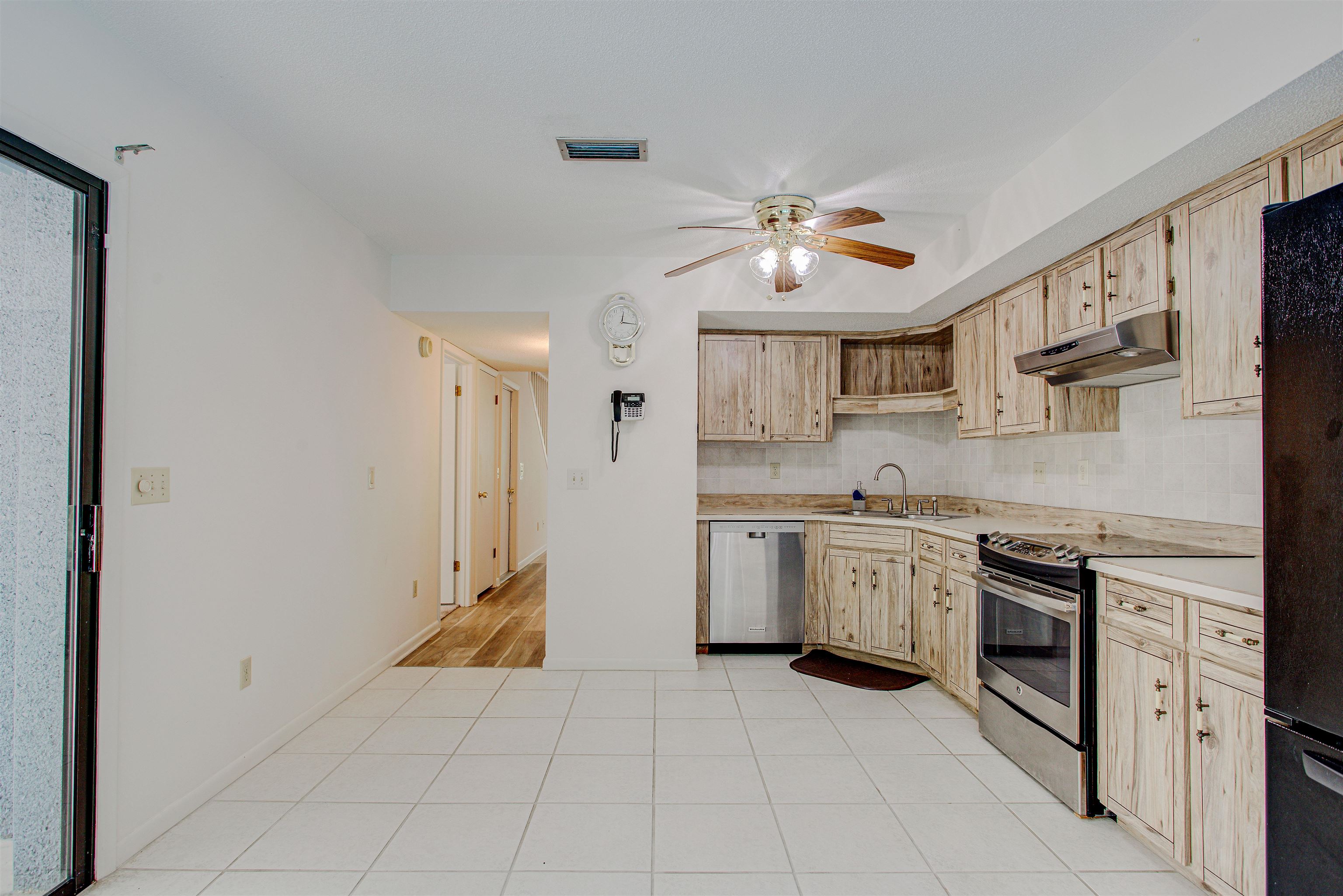 21 Atlantic Oaks Circle St. Augustine, FL 32080 - Photo 7 of 21 a kitchen with stainless steel appliances granite countertop a stove sink and cabinets