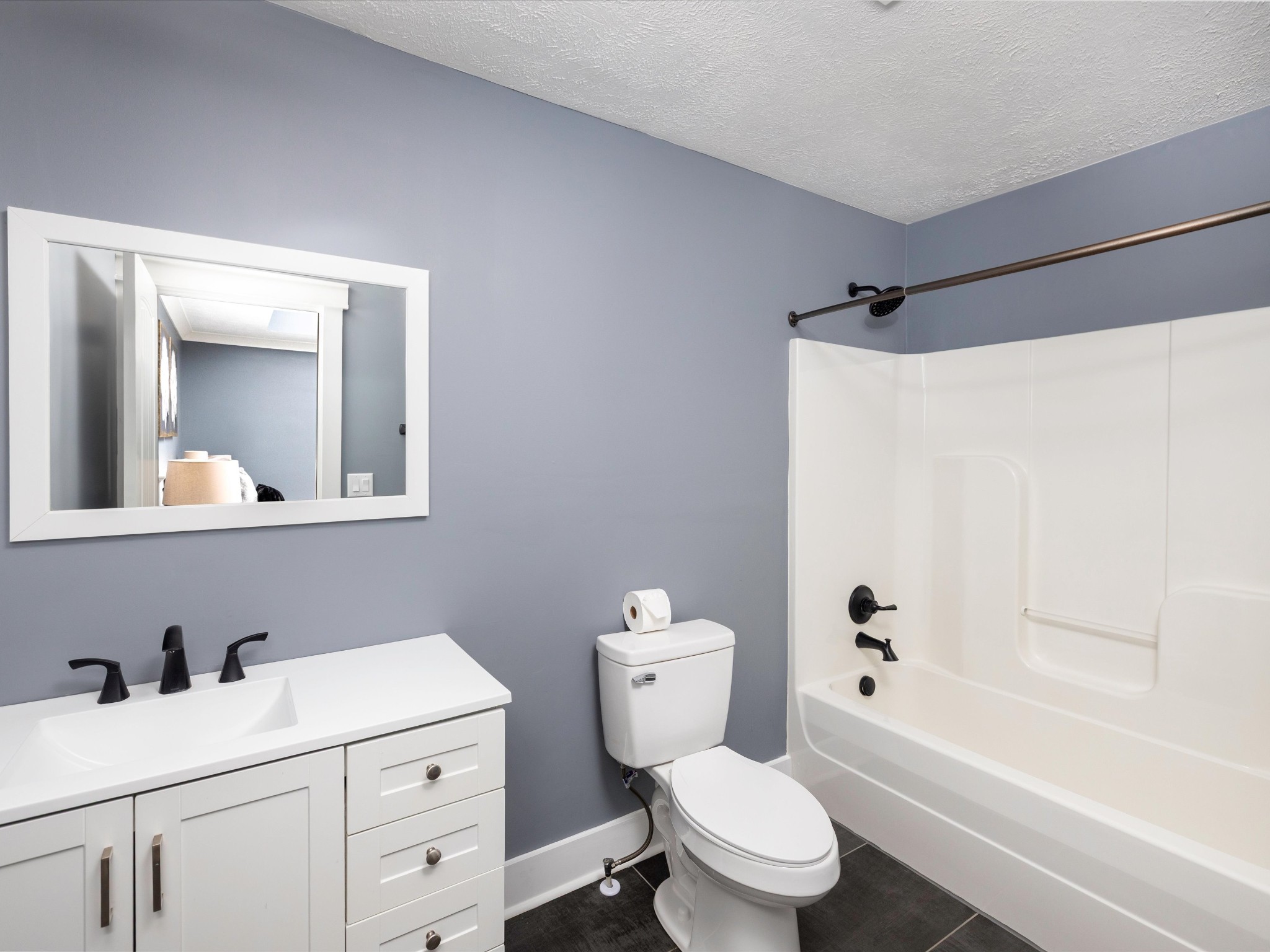 154 County Line Road Bell Buckle, TN 37020 - Photo 12 of 21 a bathroom with a toilet a sink and a bathtub