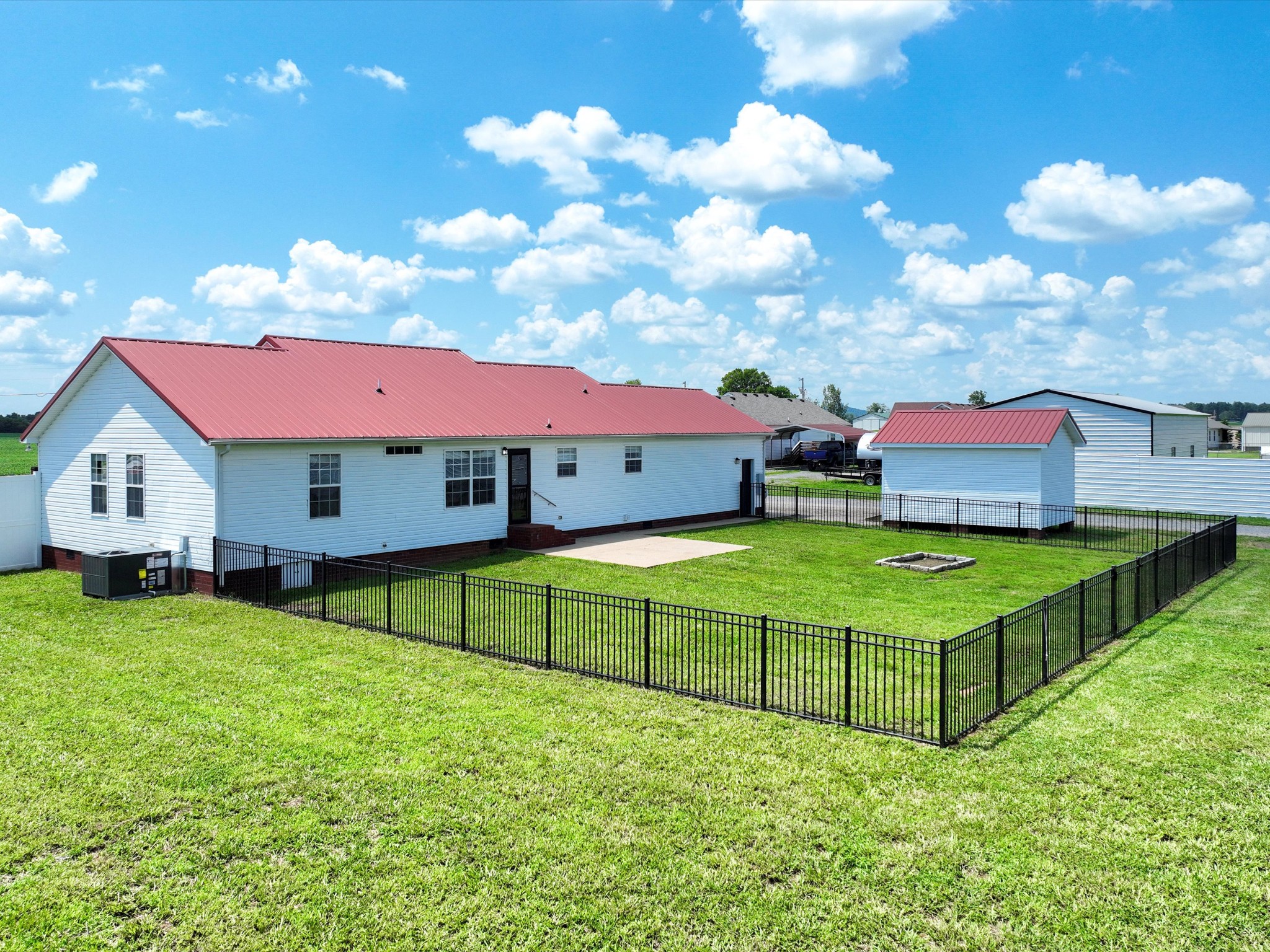 154 County Line Road Bell Buckle, TN 37020 - Photo 17 of 21 a view of an house with backyard space and balcony