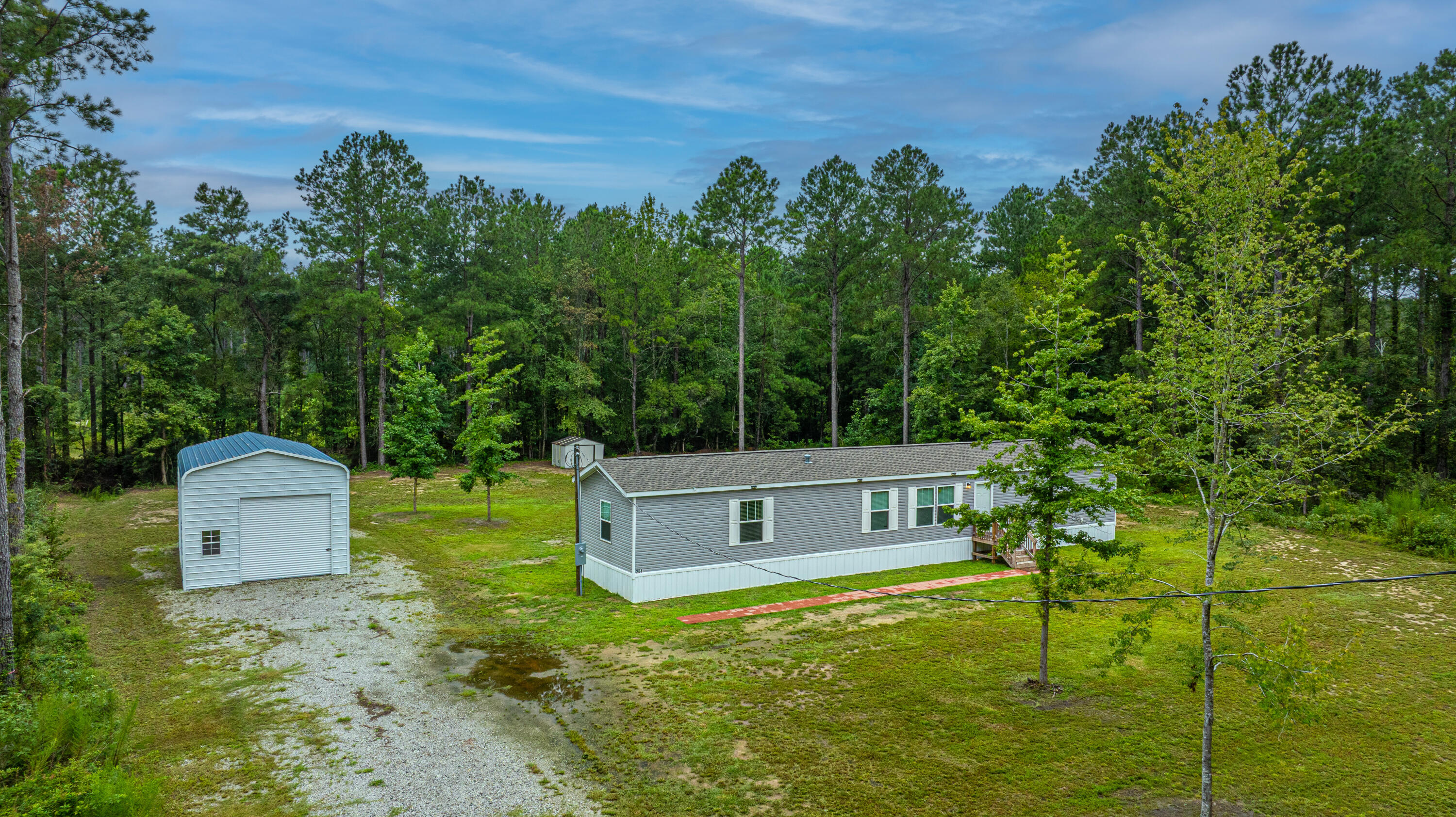204 Wyman Road Eutawville, SC 29048 - Photo 6 of 40 Front Exterior/ Metal Building